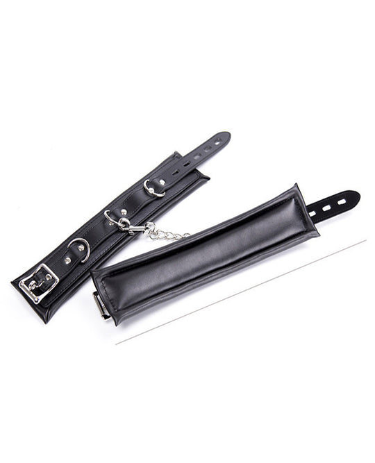 LEATHER WRIST CUFFS.