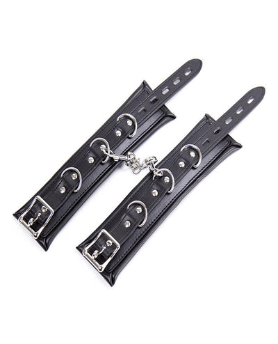 LEATHER WRIST CUFFS.