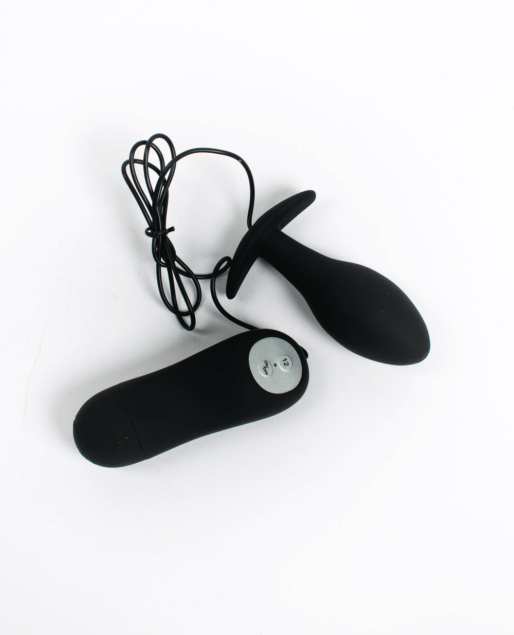 VIBRATING REMOTE ANAL PLUG.